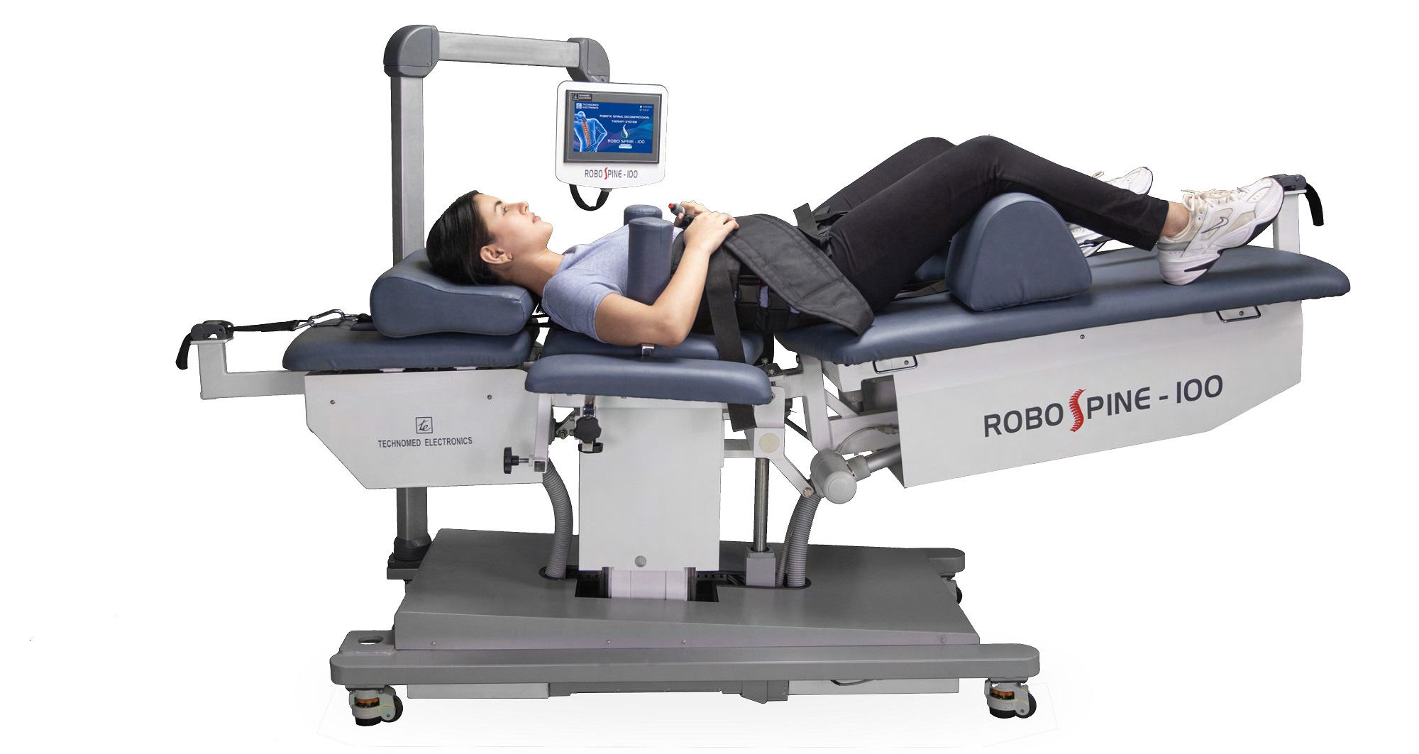 ROBO SPINE-100 spinal decompression machine with a patient positioned for treatment